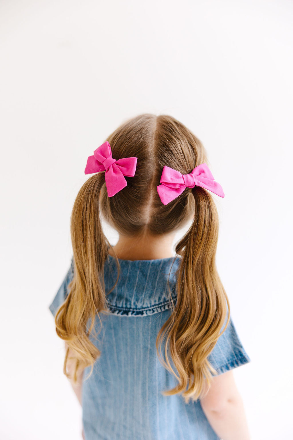 White Mini Solid Pinwheel Pigtail Bow Set
